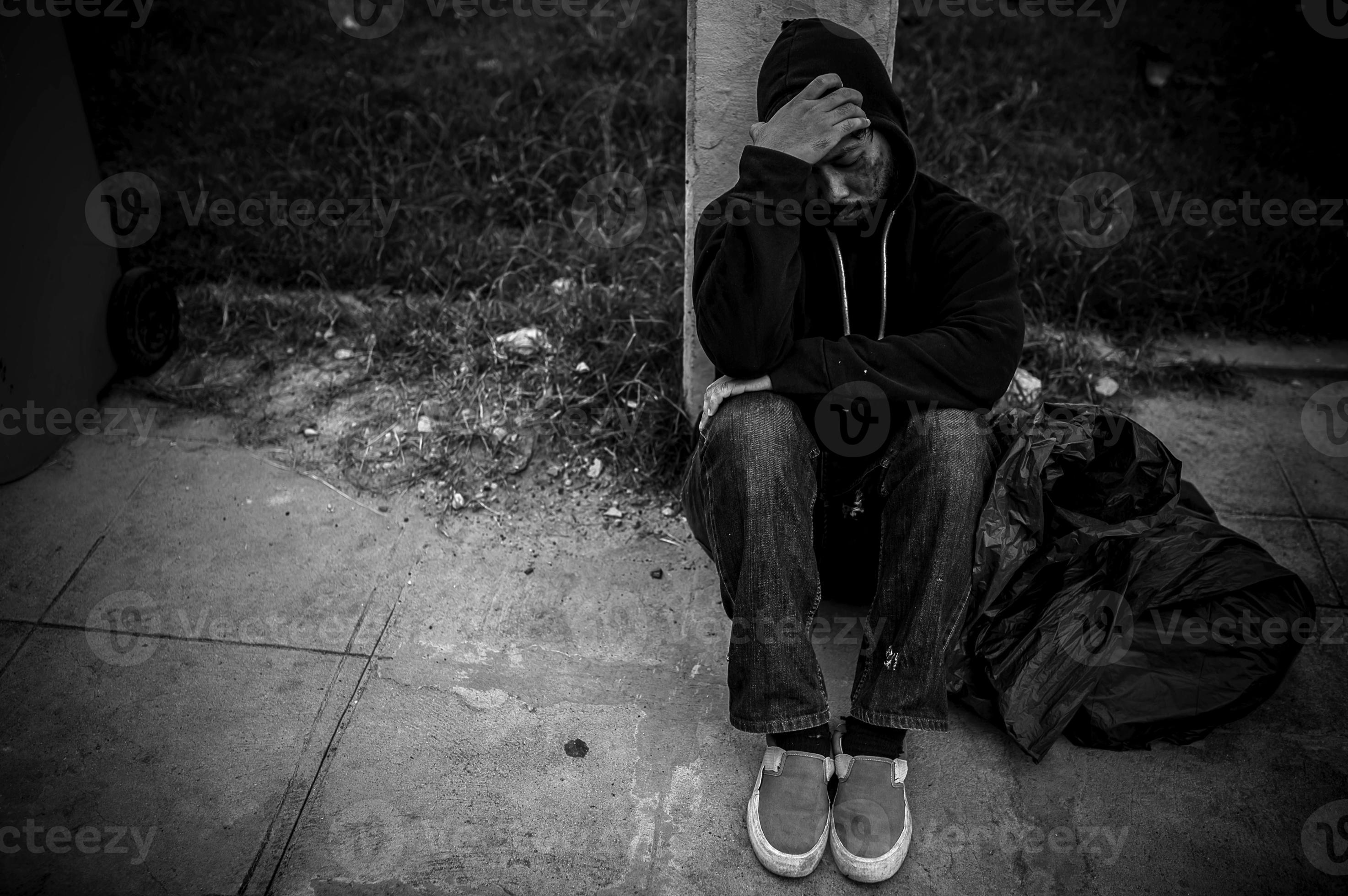 Asian man is homeless at the side road,A stranger has to live on the road alone because he has