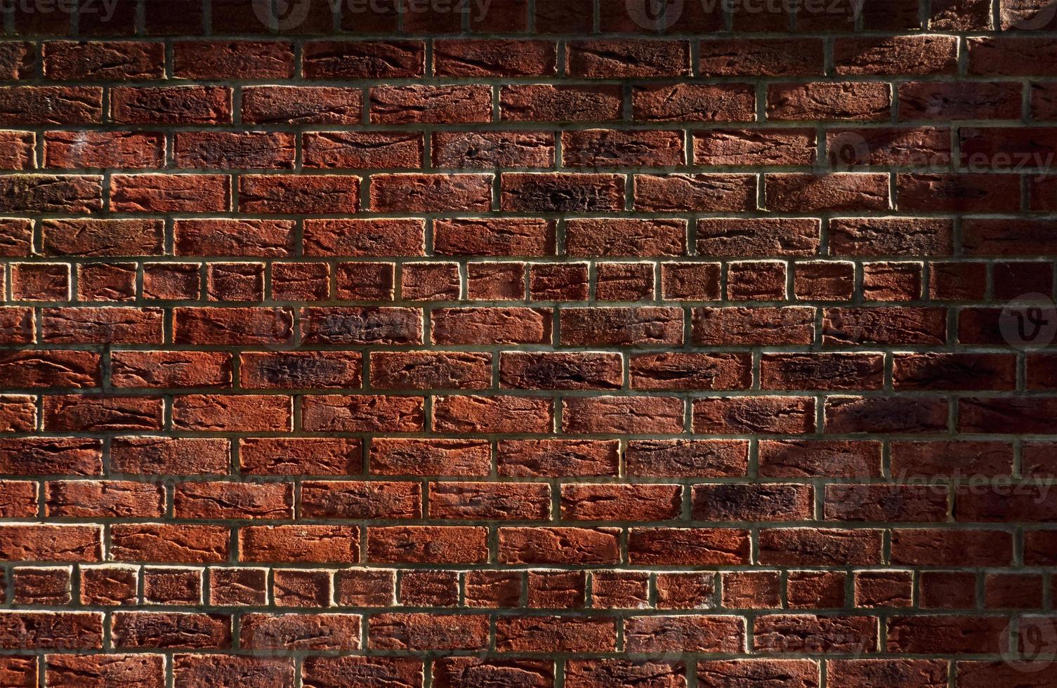 Brick wall with light and shadow,House wall red grunge stones background, Horizontal backdrop Abstract with broken bricks texture, English heritage old Vintage house wall with cracks and scratches photo