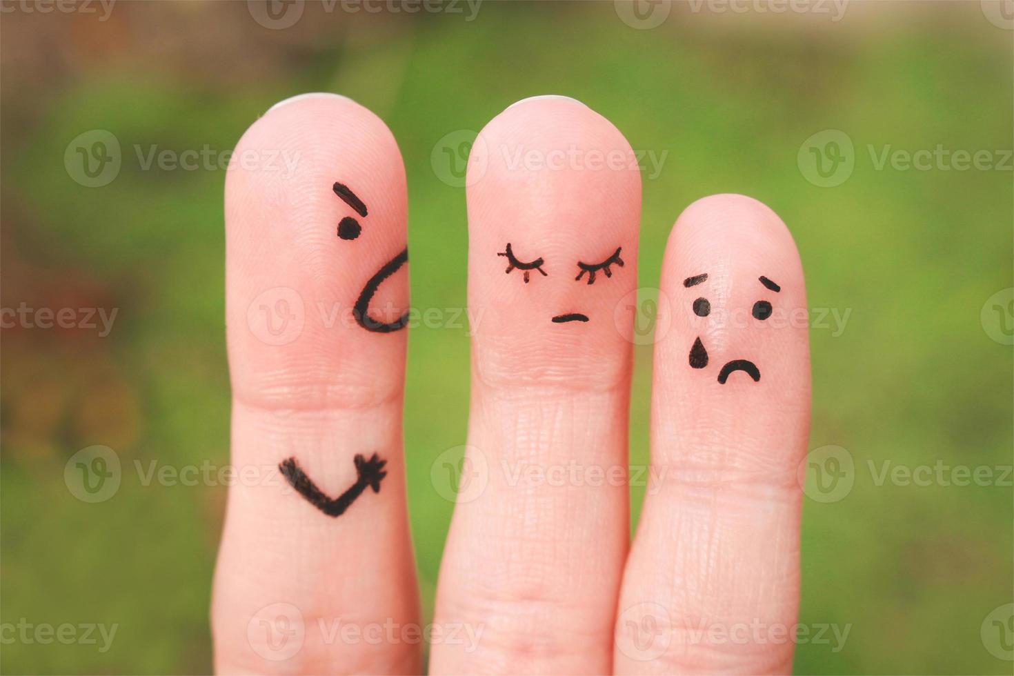 Finger art of a family during an argument. The concept of a man scolds his wife and child, a woman is sad, the baby is crying photo