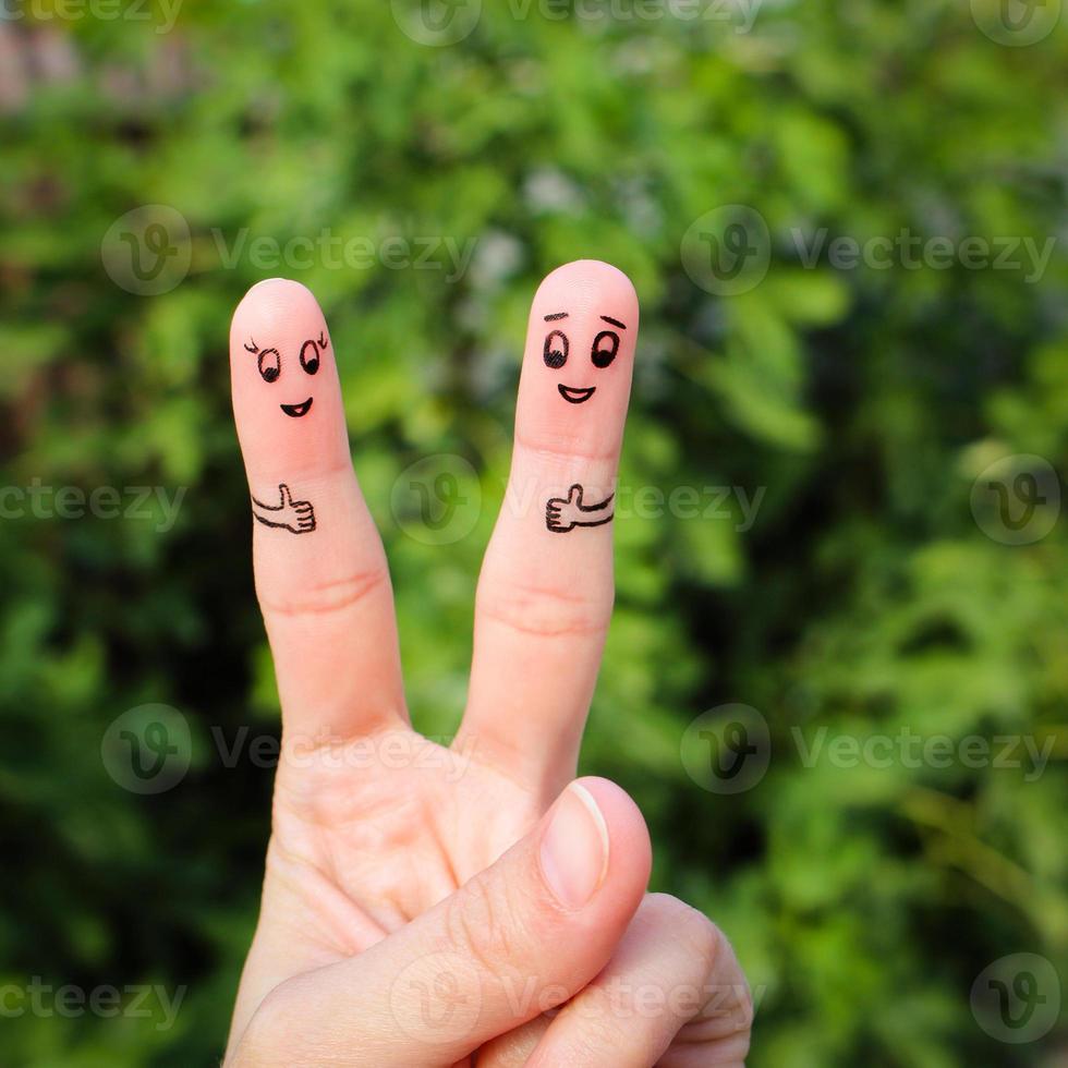 Finger art of Happy couple showing thumbs up photo