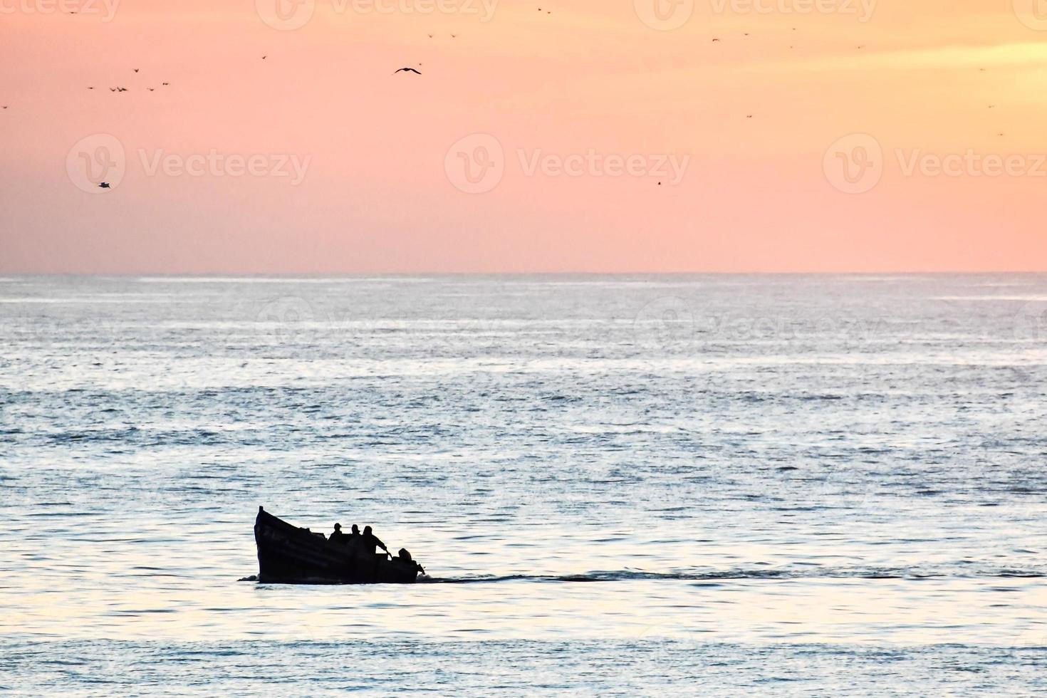 Sunset over the sea photo