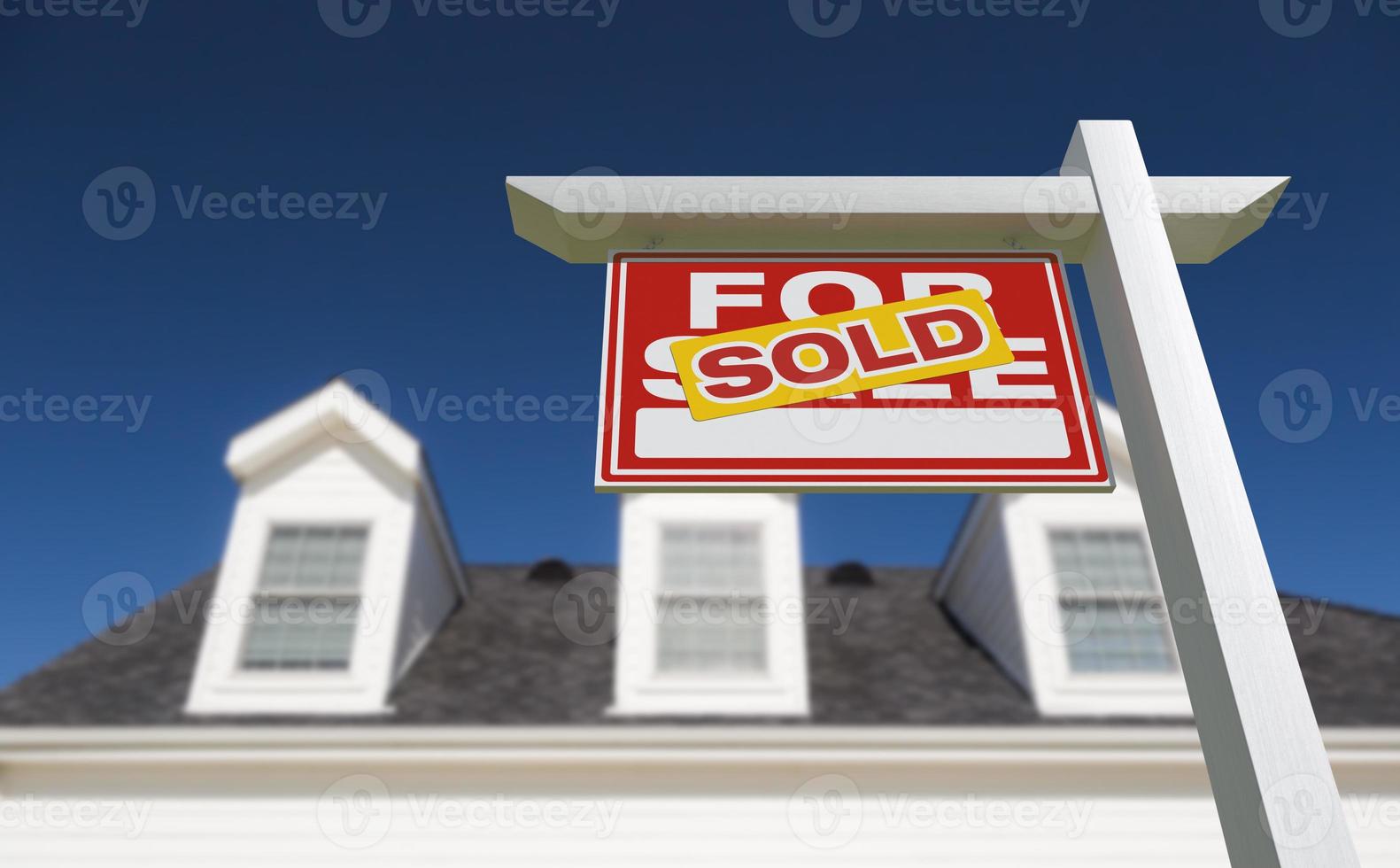 Sold For Sale Real Estate Sign in Front of New House. photo