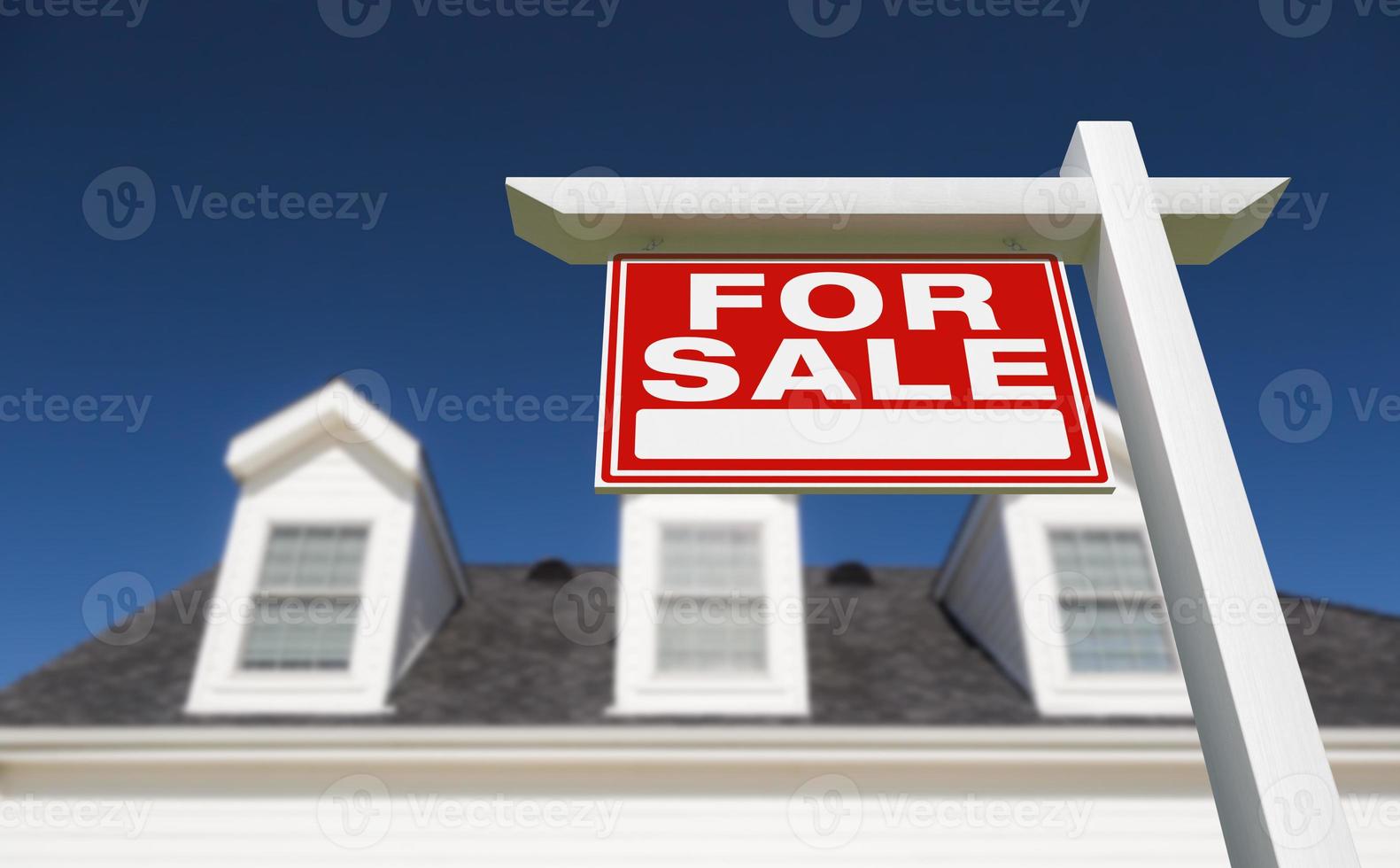 For Sale Real Estate Sign in Front of New House. photo