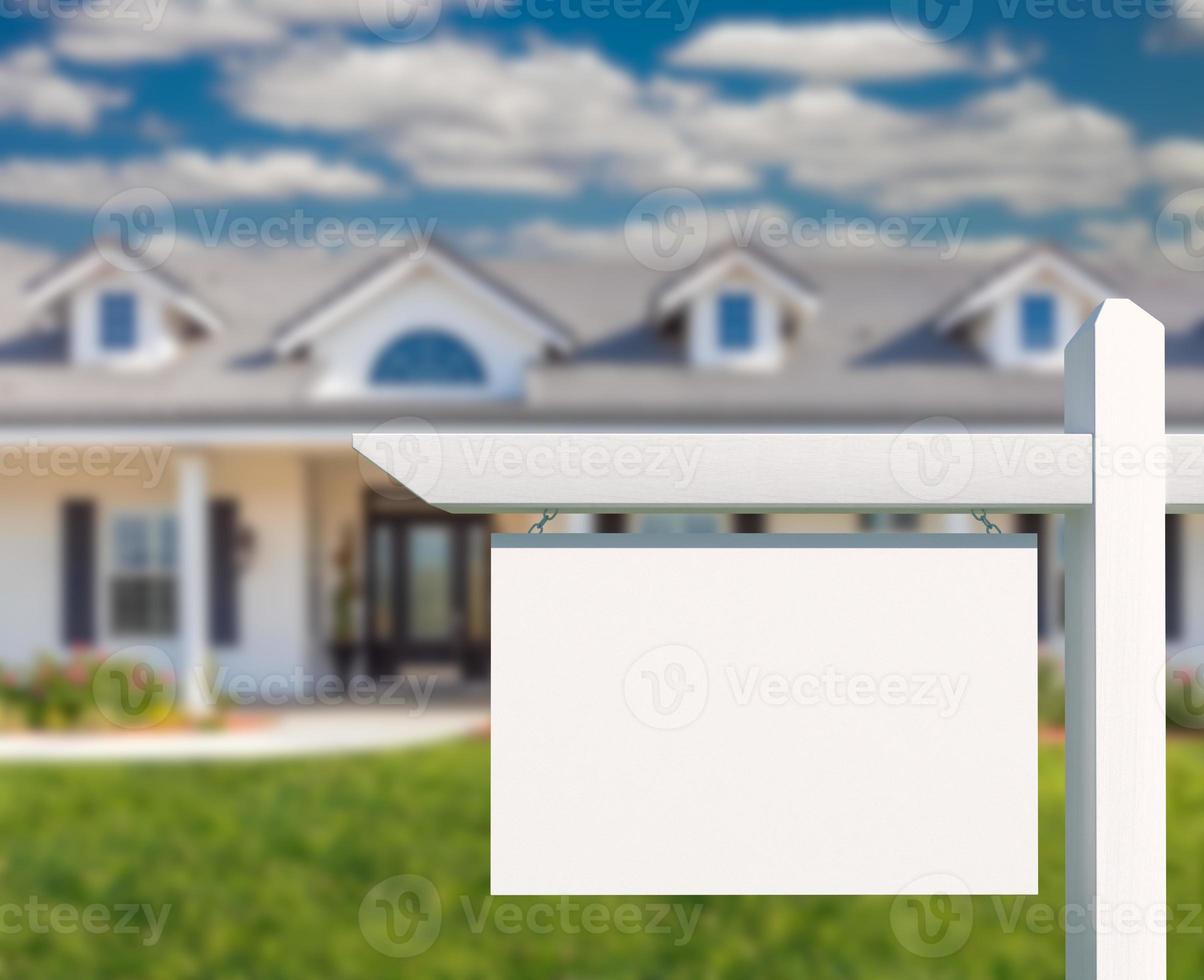 Blank Real Estate Sign in Front of New House. photo