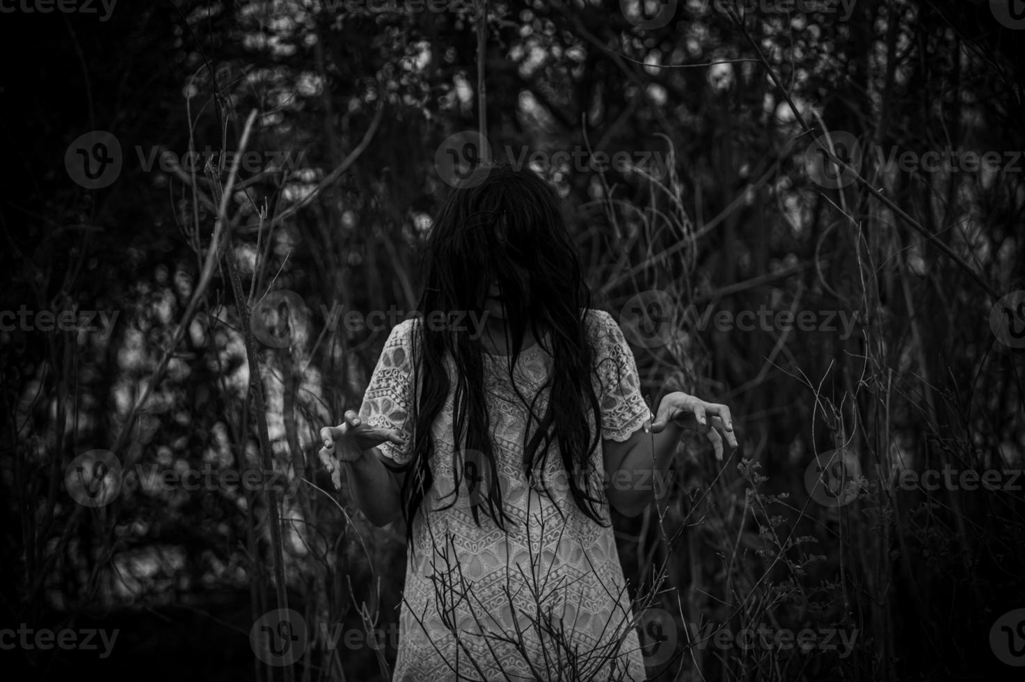 Portrait of asian woman make up ghost face at the swamp,Horror in water scene,Scary at river,Halloween poster,Thailand people photo