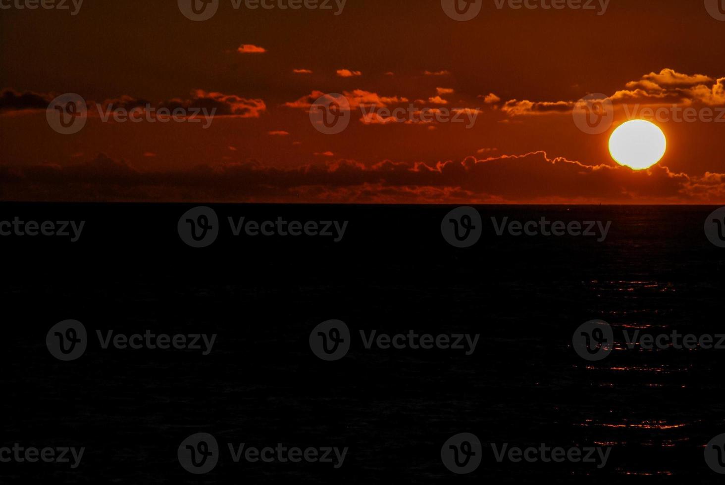 Sunset over the sea photo