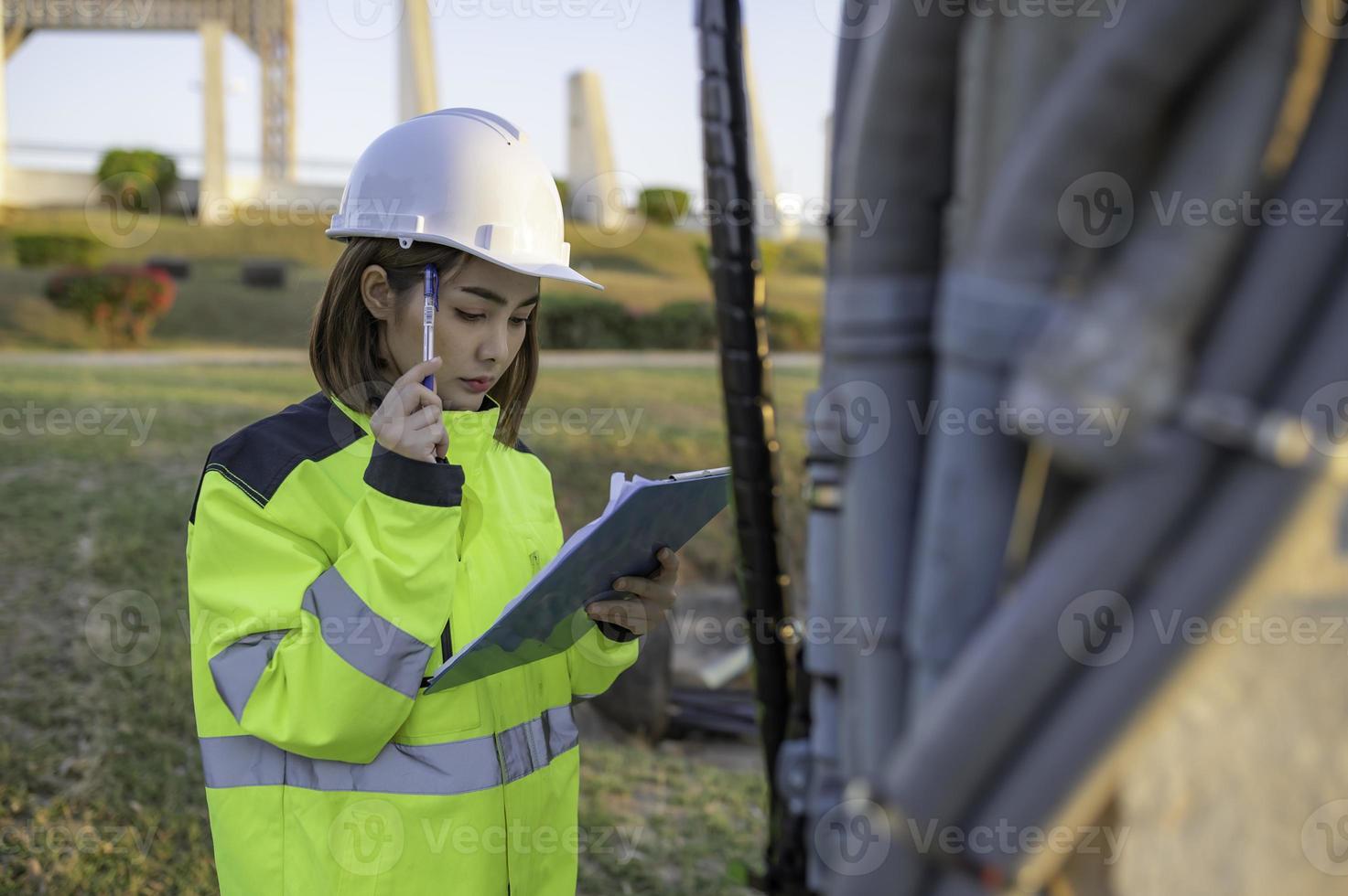 Telecommunication engineers work at cell towers for 5G cell phone signals,Network tower maintenance technicians photo