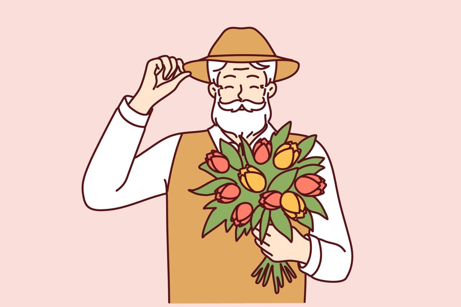 Cheerful elderly man holds bouquet of spring flowers touches hat in greeting for happy old age concept. Positive gray-haired man with mustache and beard holds flowers tulips grown in own garden vector