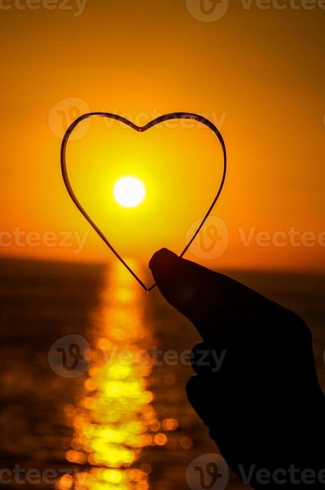 Heart and sunset photo