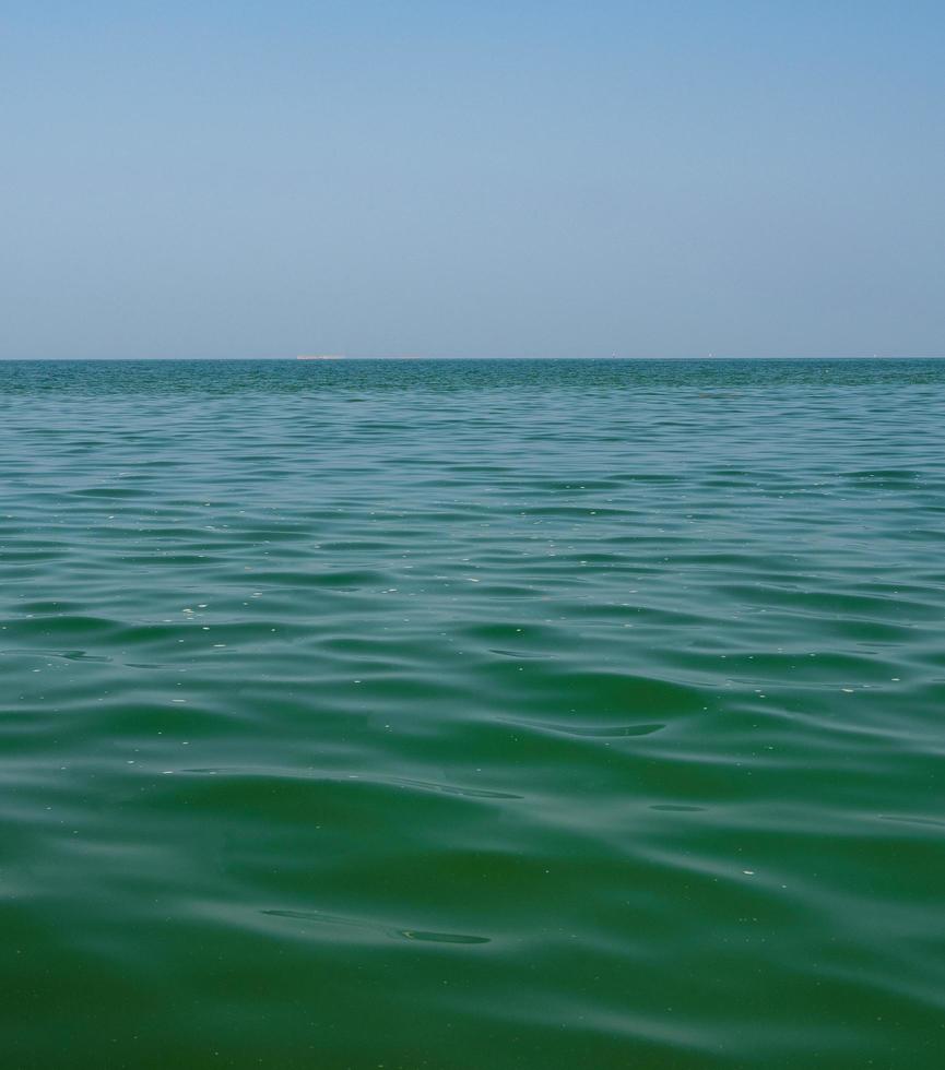 front view landscape Blue sea and sky blue background morning day look calm summer Nature tropical sea Beautiful  ocen water travel Bangsaen Beach East thailand Chonburi Exotic horizon. photo