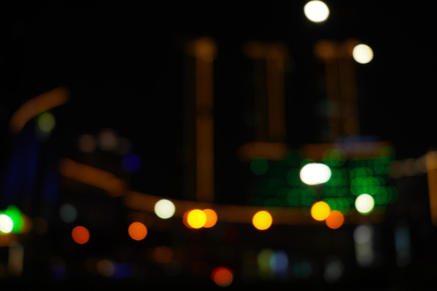 Defocused urban abstract texture background, blurred lights, City night light, light bokeh photo