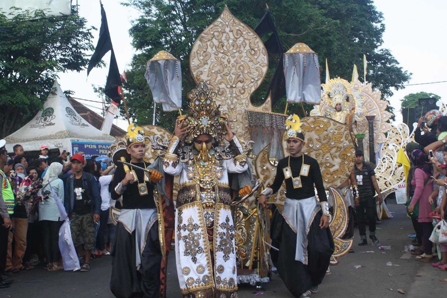 JEMBER, JAWA TIMUR, INDONESIA - AUGUST 25, 2015  jember fashion carnival participants are giving their best performance with their costumes and expressions during the event, selective focus. photo