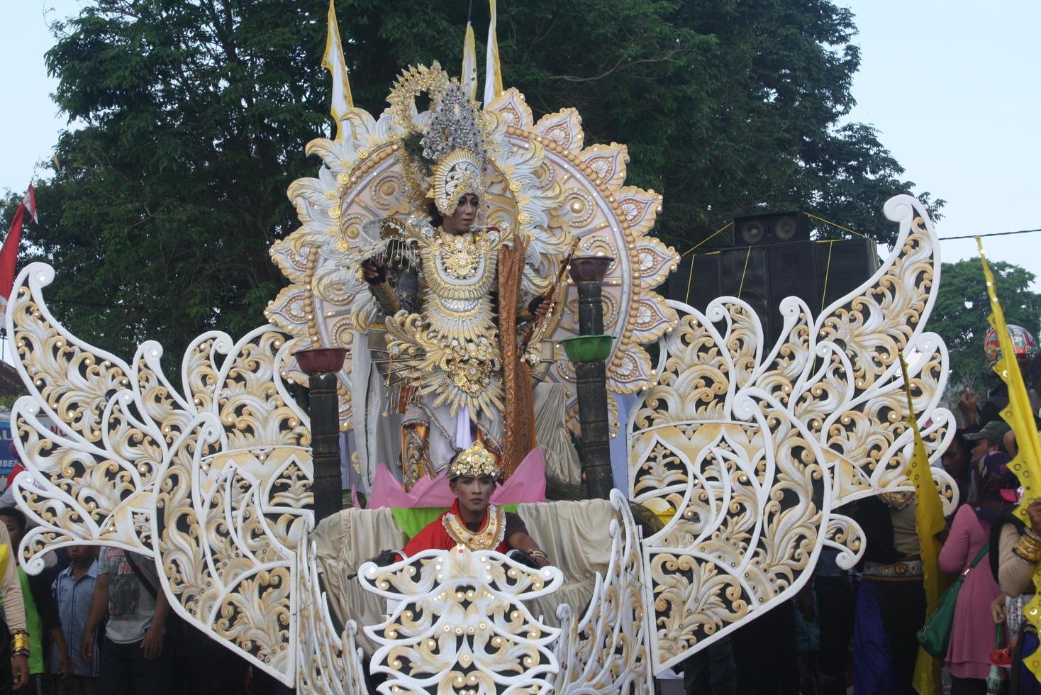 JEMBER, JAWA TIMUR, INDONESIA - AUGUST 25, 2015  jember fashion carnival participants are giving their best performance with their costumes and expressions during the event, selective focus. photo