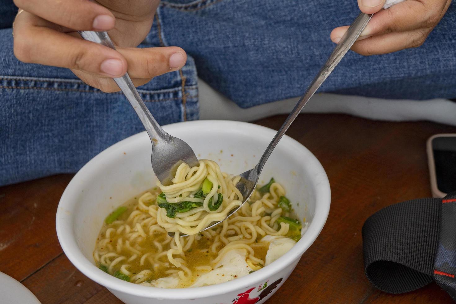 Traditional noodles of Semarang Instant Noodles with eggs. The photo is suitable to use for food background, menu poster and food content media.