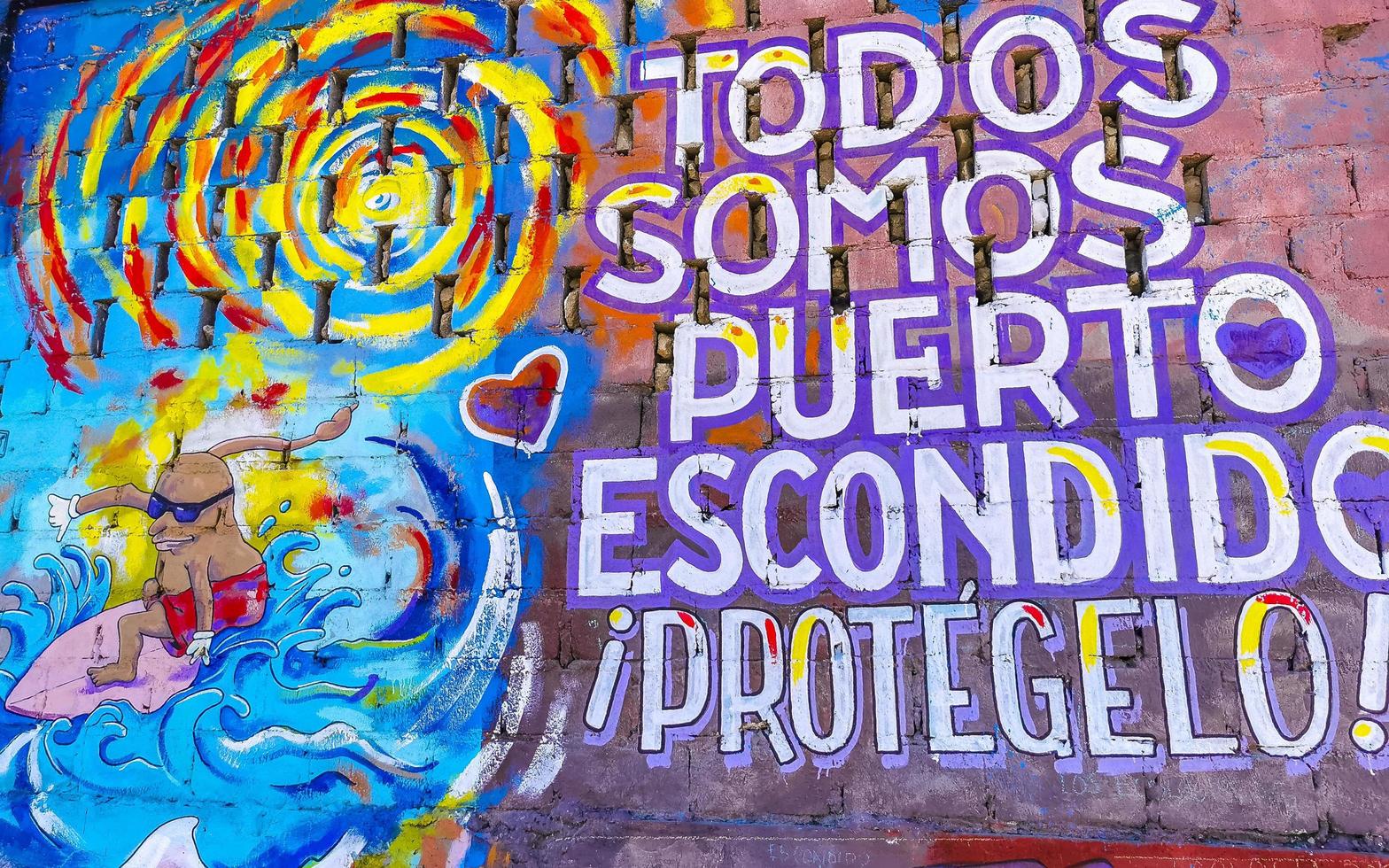 Puerto Escondido Oaxaca Mexico 2023 Wall with graffiti art drawings paintings in Puerto Escondido Mexico. photo