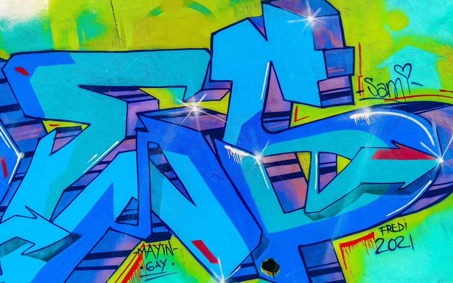 Puerto Escondido Oaxaca Mexico 2023 Wall with graffiti art drawings paintings in Puerto Escondido Mexico. photo