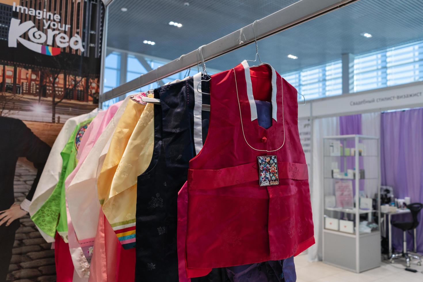 Kamchatka, Russia, Oct 17, 2019 - Hanbok - Korean traditional women clothes vibrant color for attire during traditional occasions festivals, celebrations, ceremonies. Dress hanging on clothes hanger. photo