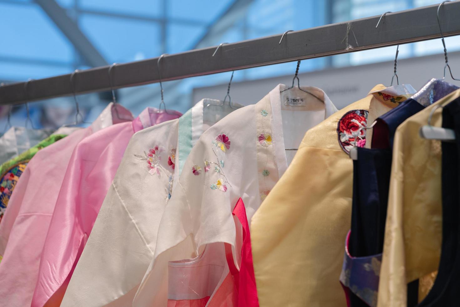 Kamchatka, Russia, Oct 17, 2019 - Hanbok - Korean traditional women clothes vibrant color for attire during traditional occasions festivals, celebrations, ceremonies. Dress hanging on clothes hanger. photo