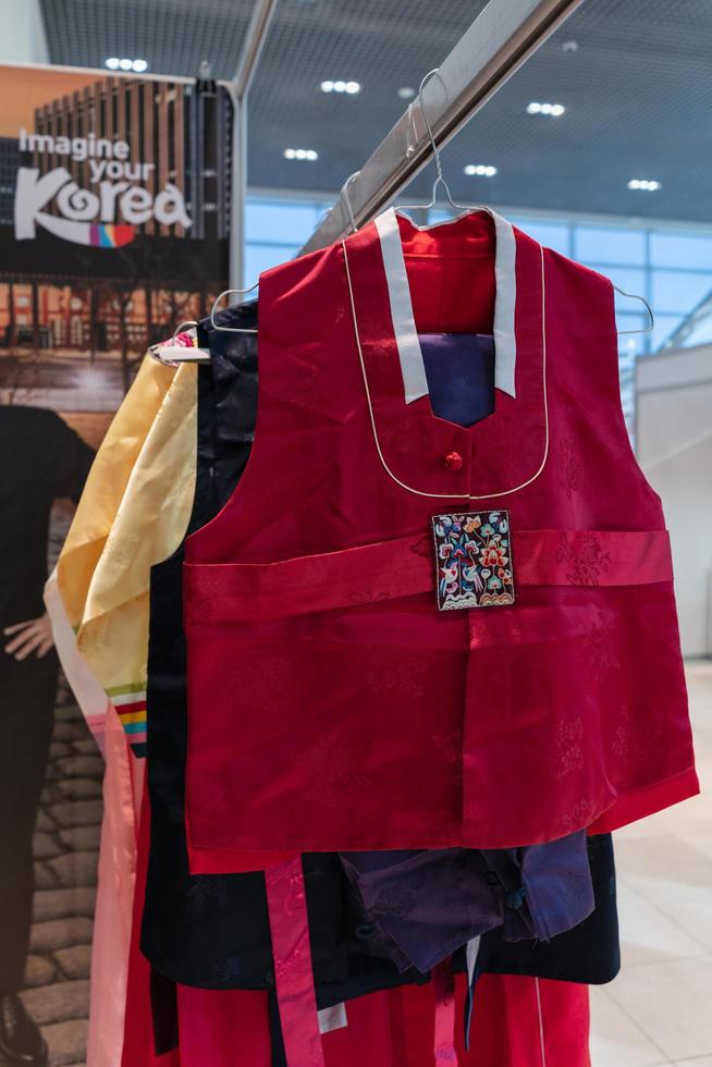 Kamchatka, Russia, Oct 17, 2019 - Hanbok - Korean traditional women clothes vibrant color for attire during traditional occasions festivals, celebrations, ceremonies. Dress hanging on clothes hanger. photo