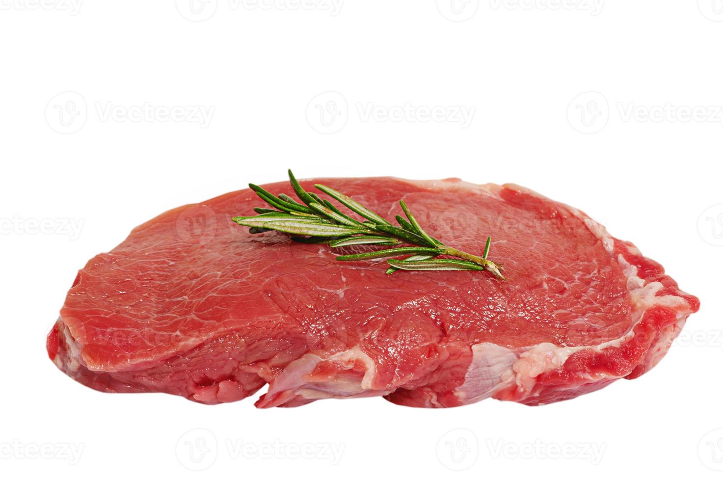 Raw fresh beef steak isolated on white background. Meat with rosemary. photo
