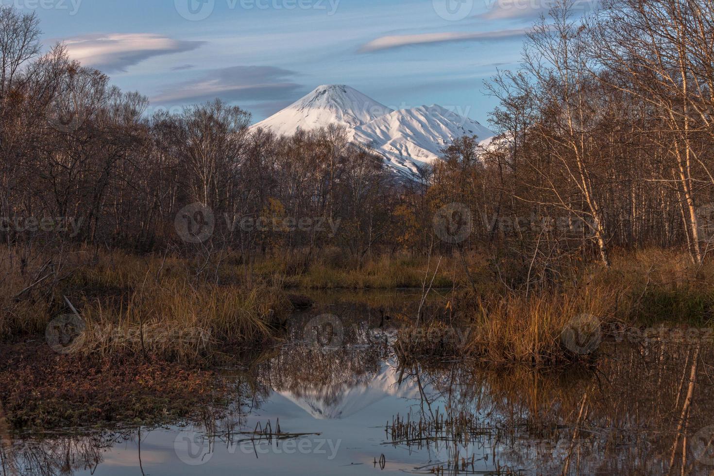 Reflection of Avach volcano in Kamchatka photo