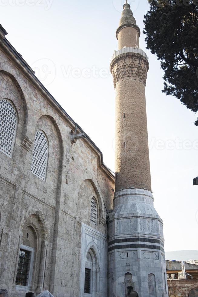 Minaret of Ulucami Mosque in Bursa, Turkey. The mosque is the largest mosque in Bursa. photo