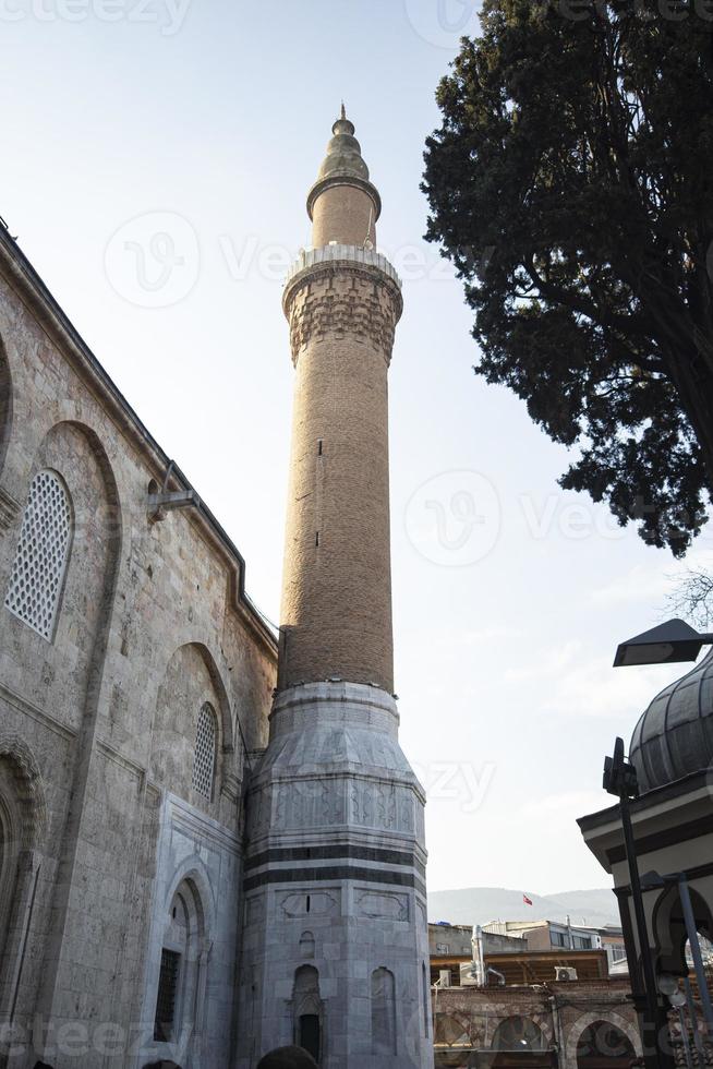 Minaret of Ulucami Mosque in Bursa, Turkey. The mosque is the largest mosque in Bursa. photo