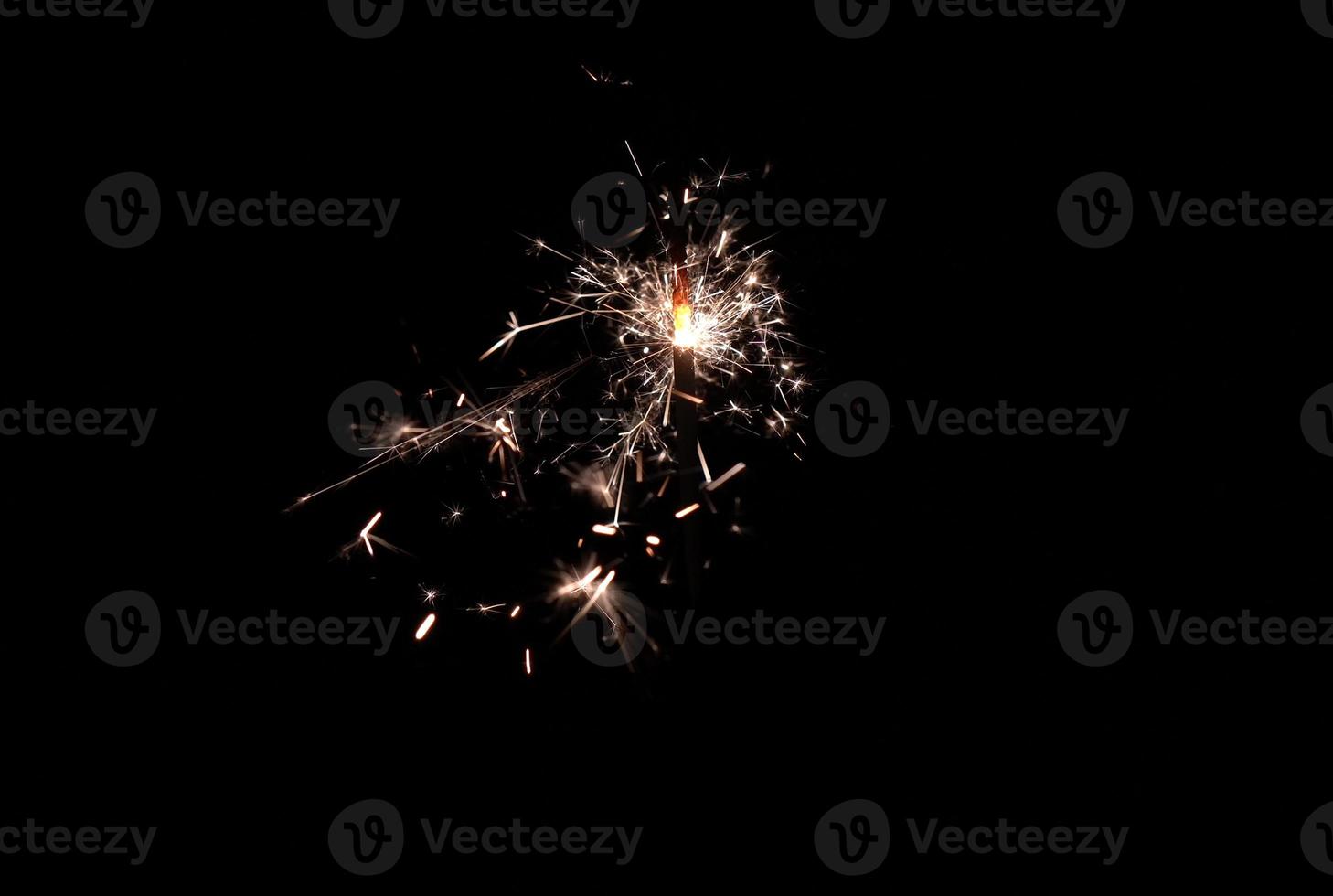 Burning spark new year pyrotechnics for festive photo