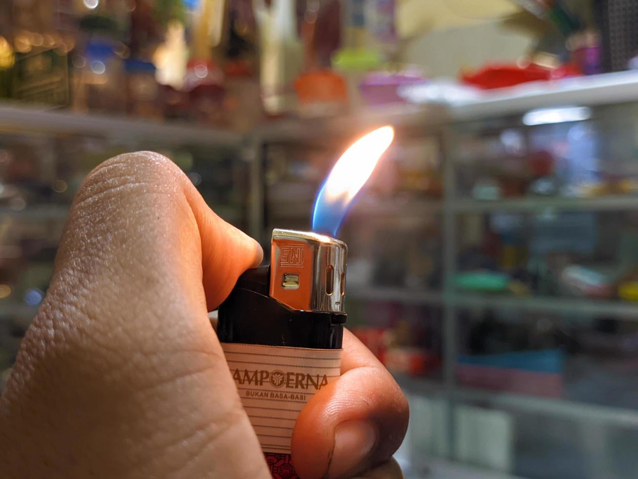 A close up of burning gas lighter photo