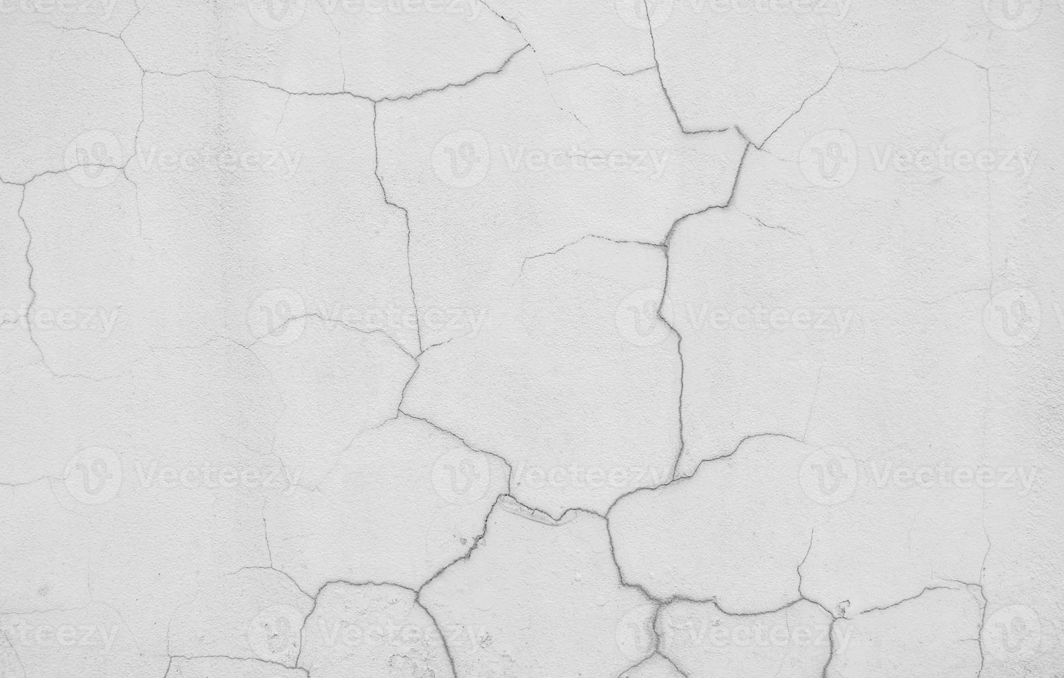 Crack white concrete wall texture background. photo