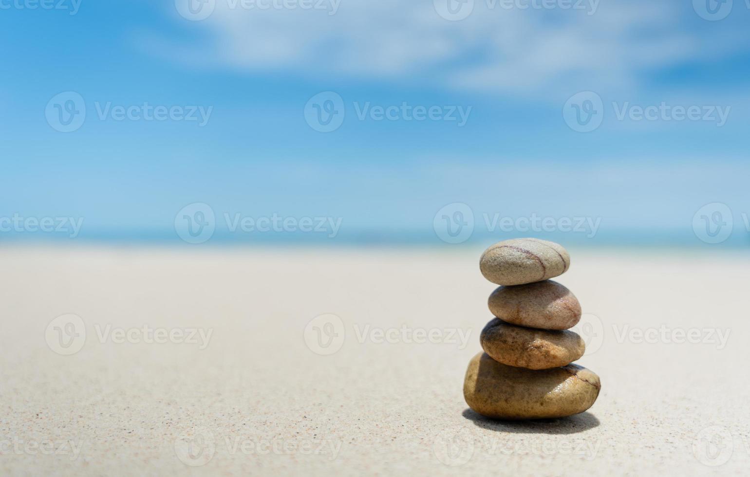 Stones balanced on beach. Zen stones meditation and relaxation. Japanese zen garden photo
