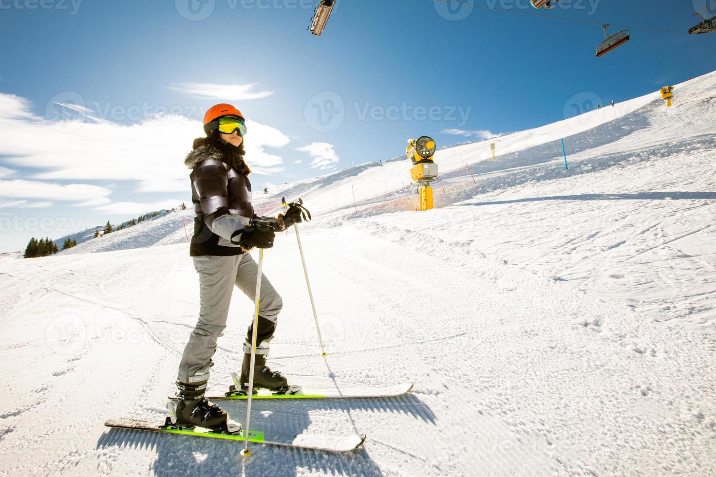 Girl at winter skiing bliss, a sunny day adventure photo