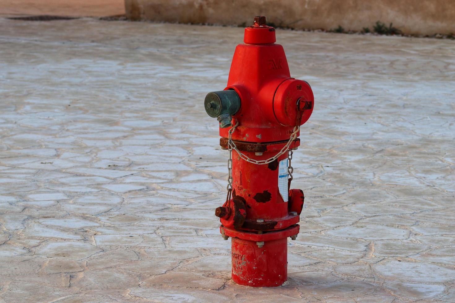 Fire hydrant pump stations on street red metal photo