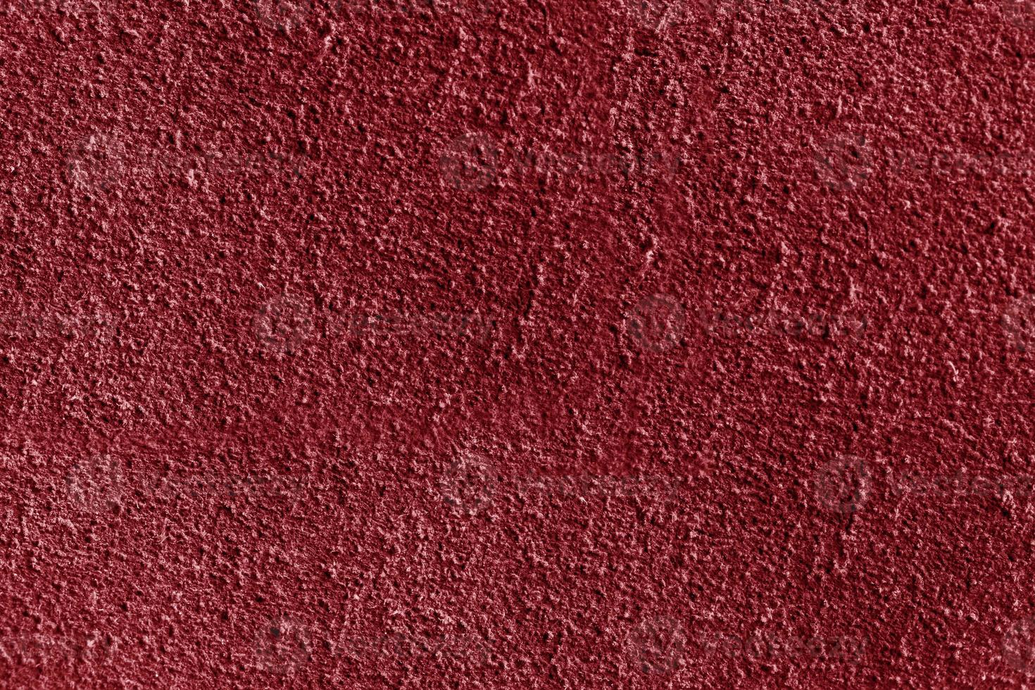 Macro texture of red suede. photo