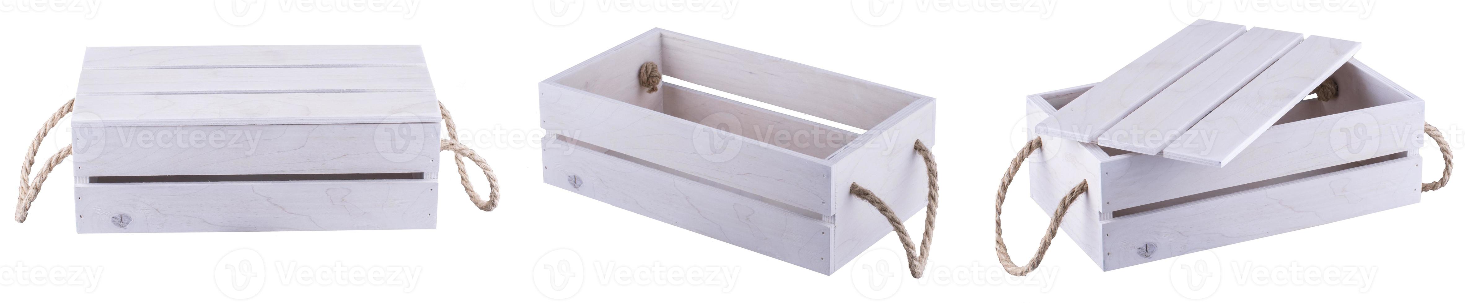 Three white wooden crates. A step of three boxes open half open and closed. photo