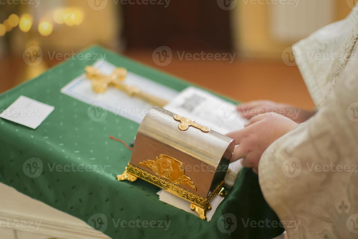 Orthodox religion. Accessories priest on the background of the cross. photo