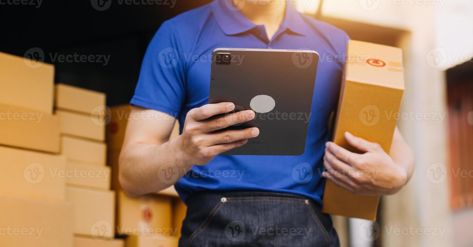 Business woman start up small business entrepreneur SME success .freelance woman working at home with Online Parcel delivery. SME and packaging deliveryconcept photo