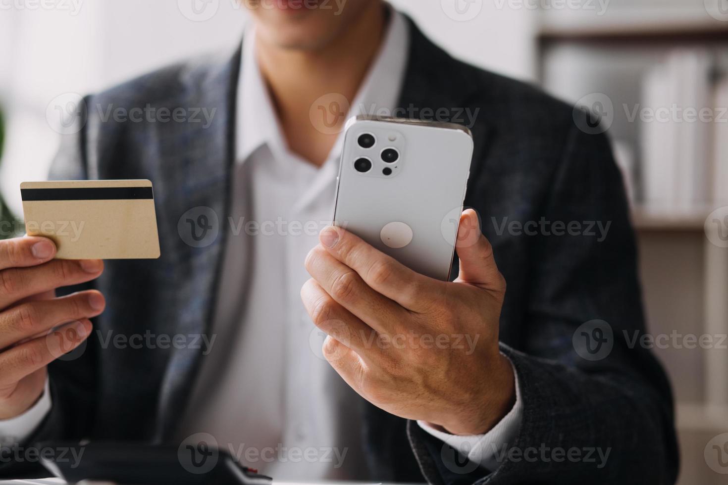 Businesswoman hands holding cradit card and using credit card online shopping. Online shopping concept photo