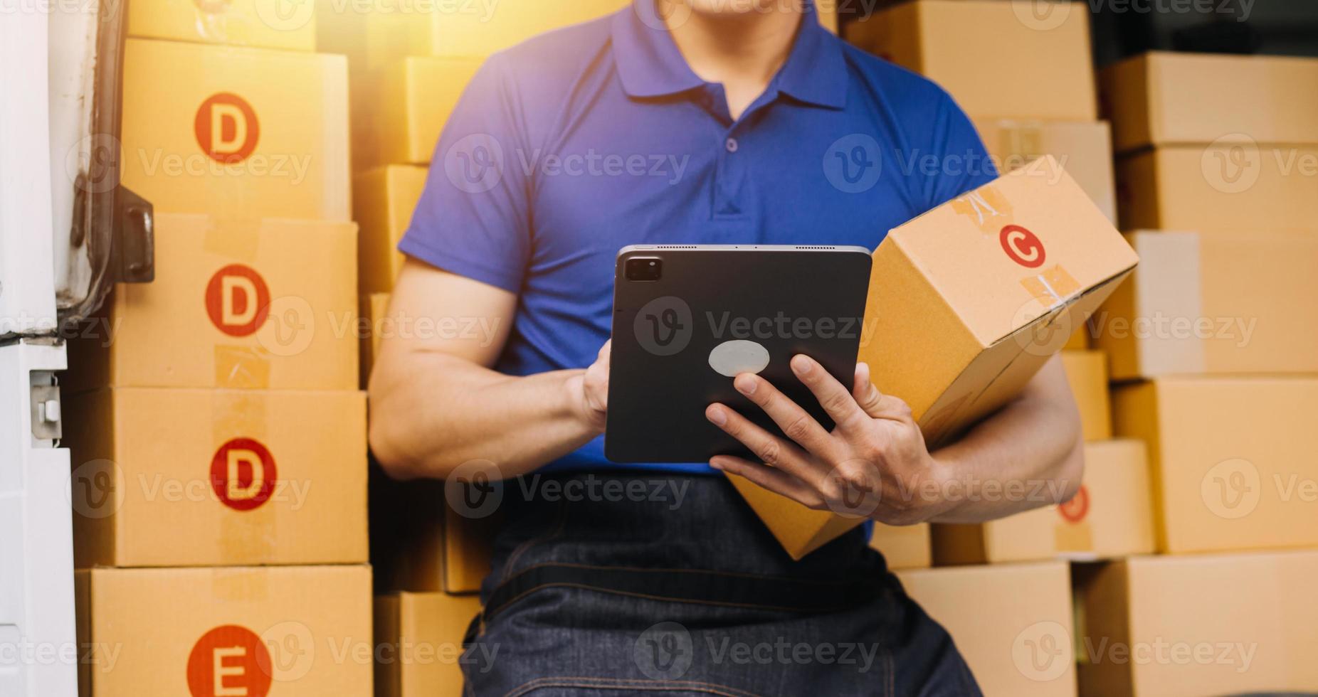 Business woman start up small business entrepreneur SME success .freelance woman working at home with Online Parcel delivery. SME and packaging deliveryconcept photo