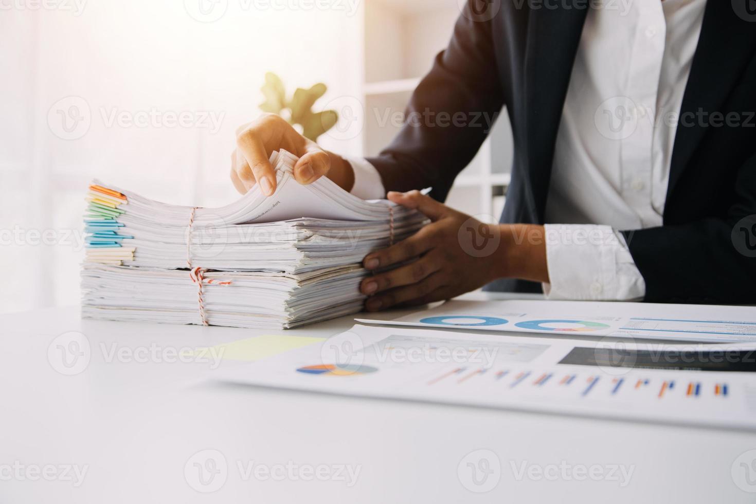 Close up view of job interview in office, focus on resume writing tips, employer reviewing good cv of prepared skilled applicant, recruiter considering application, hr manager making hiring decision photo