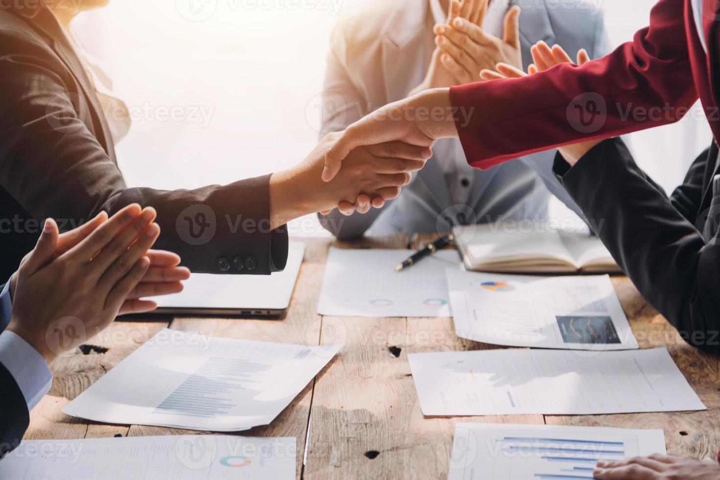 Business handshake for teamwork of business merger and acquisition,successful negotiate,hand shake,two businessman shake hand with partner to celebration partnership and business deal concept photo