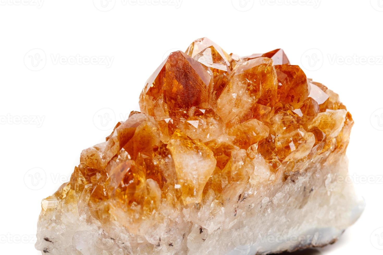 Macro mineral stone Citrine in rock in crystals on a white background photo