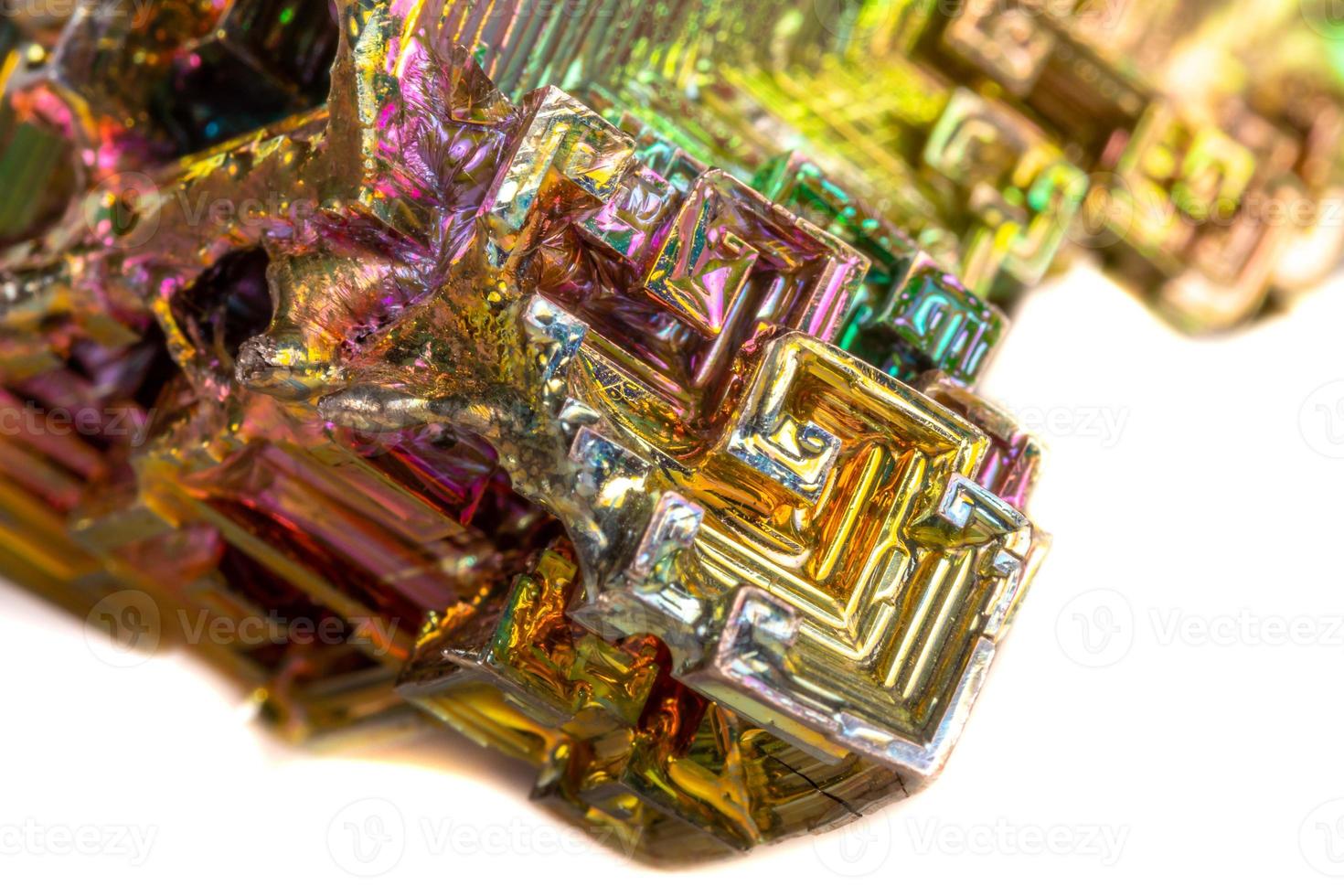 Macro of the mineral bismuth stone on a white background photo