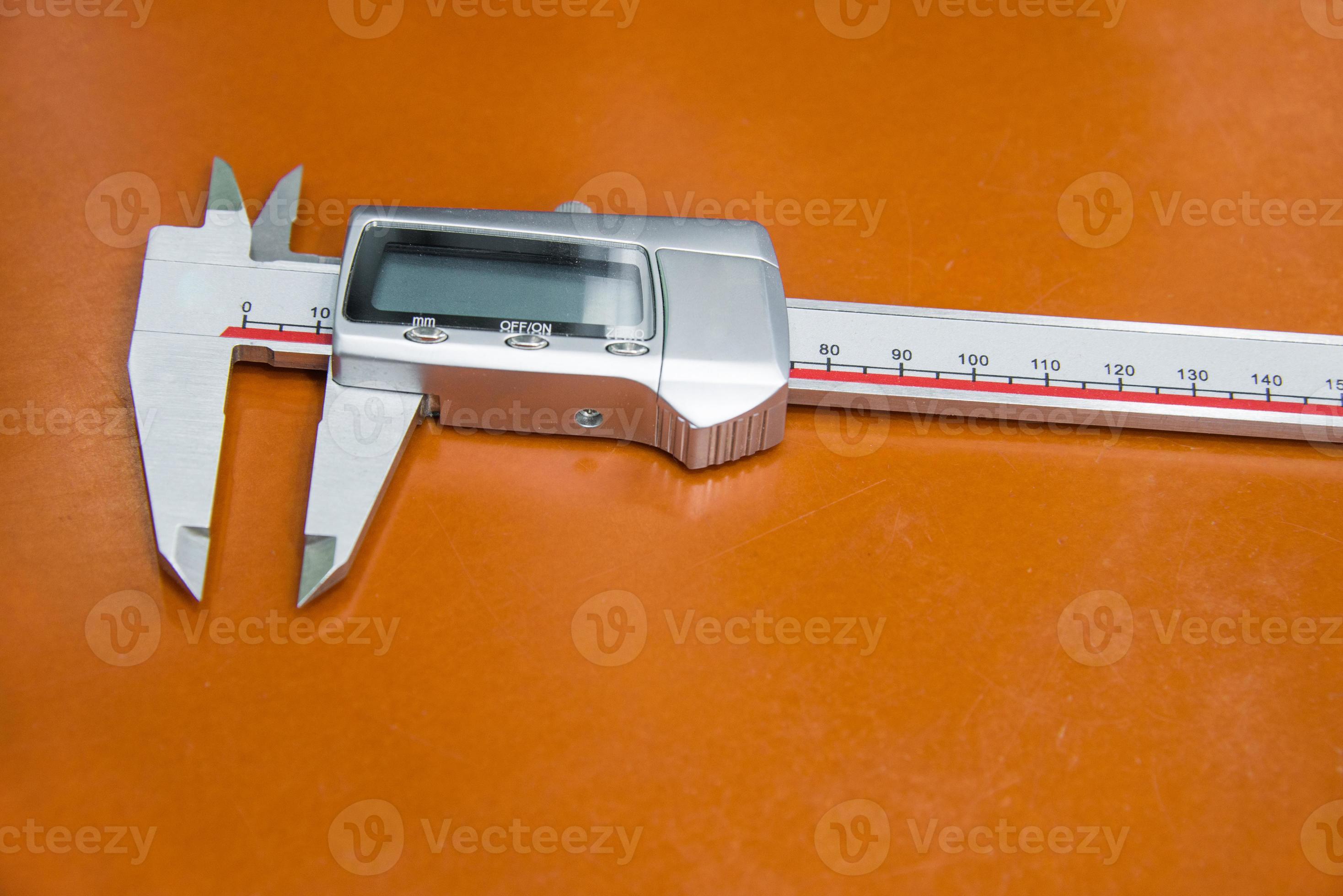 Vernier gauge on work site 21977720 Stock Photo at Vecteezy