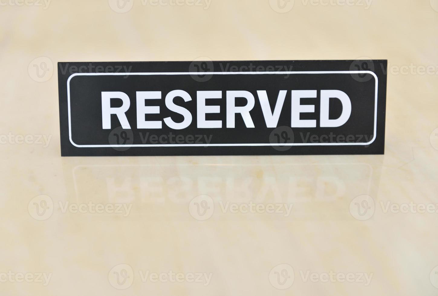 Reserved sign on the table photo