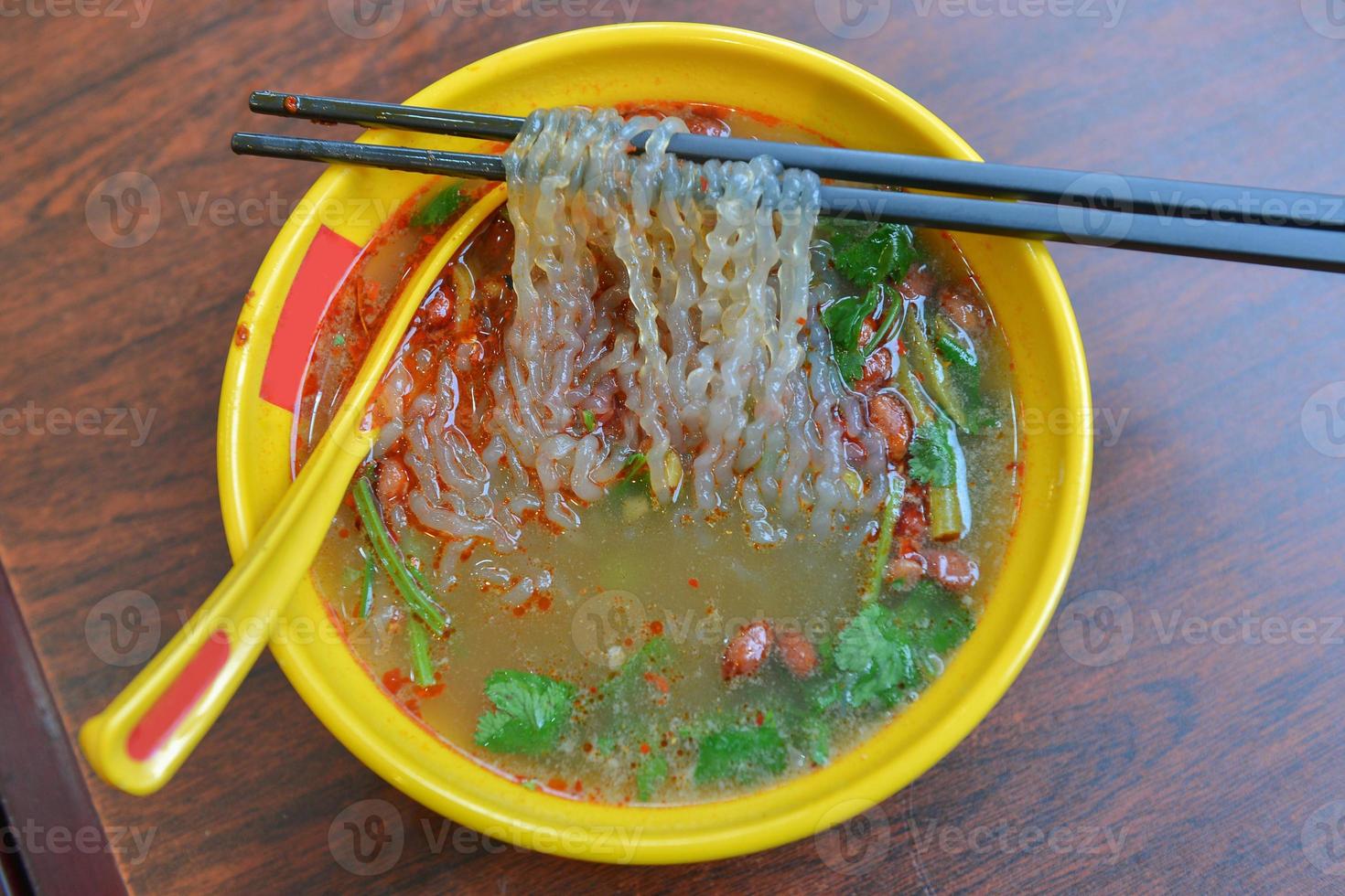 Chinese vermicelli noodles with spicy soup photo