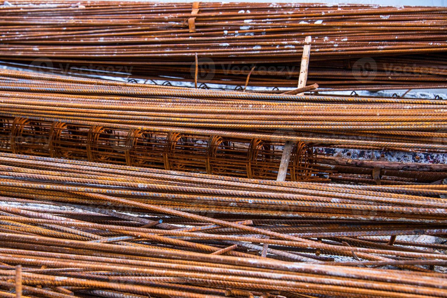 used and rusty steel bar, material for industrial background photo