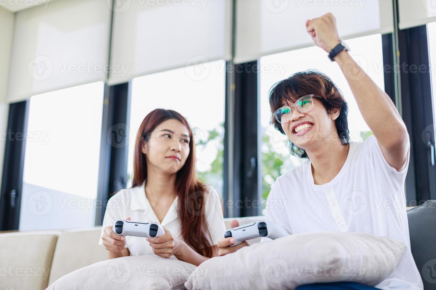 Married Life, Couple Bonding Over Video Games in Their Living Room photo