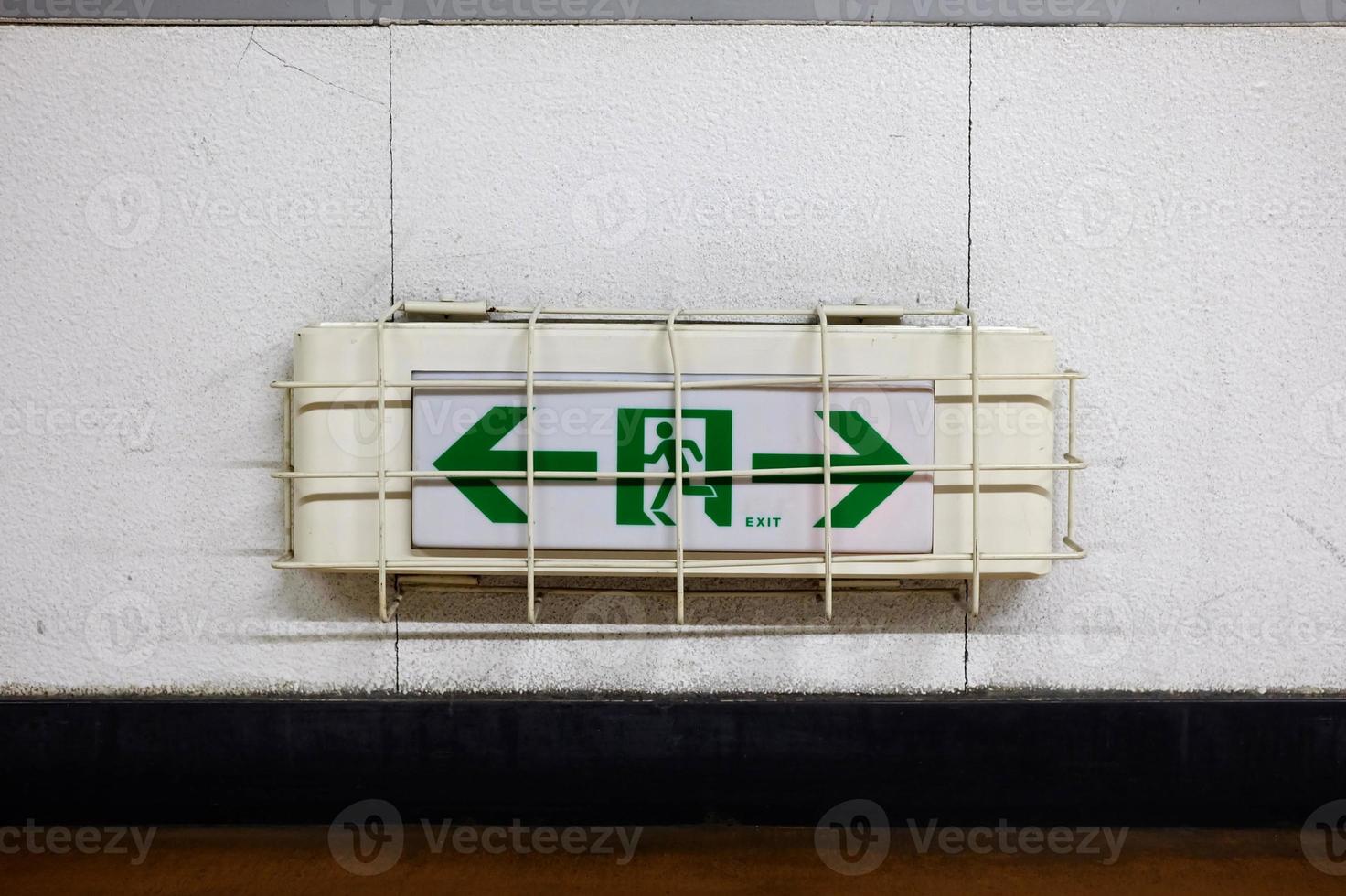Emergency Exit Sign on Wall. photo