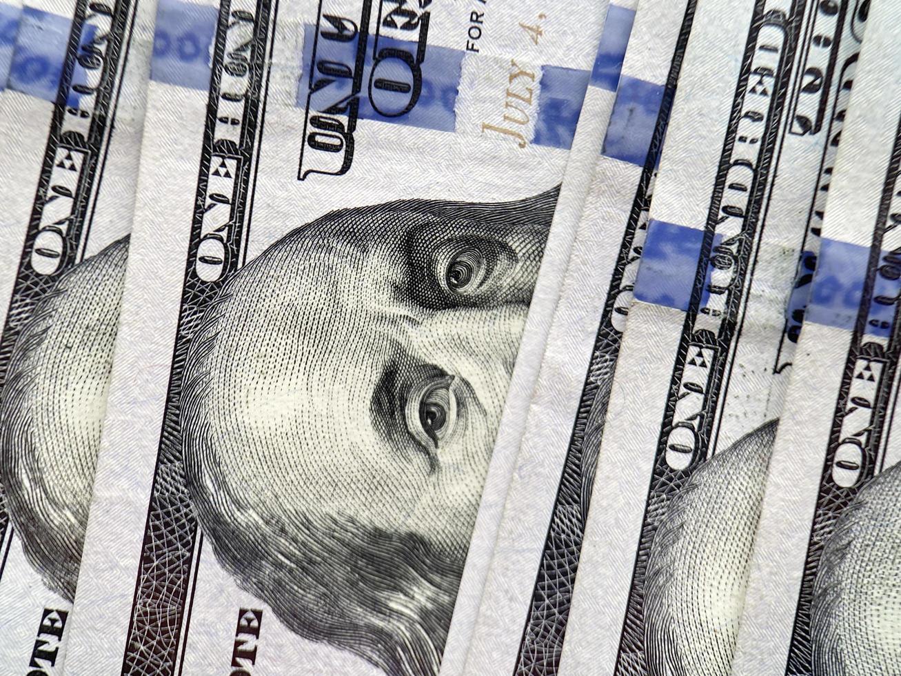 several one hundred United States dollars banknotes photo